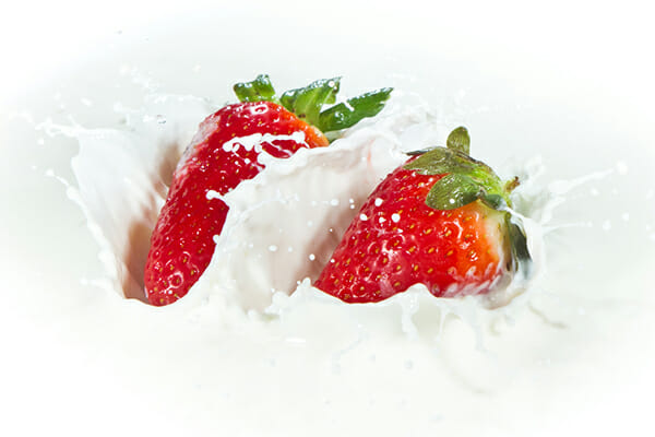 A high-speed strawberry-and-cream splash &mdash; a creative project from the iPhotography Home Projects Course.