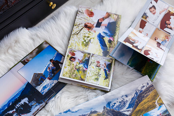 an overhead angle looking down at open family album photo books