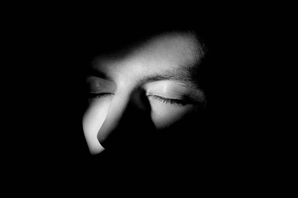Low Light Portrait Photography Tips by iPhotography.com