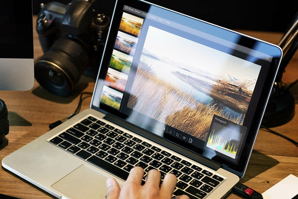 Man editing photos on a computer