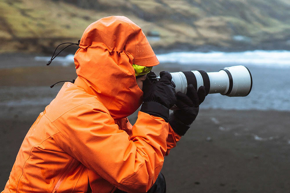 Landscape photographer at Tjørnuvík beach in the Faroe Islands
