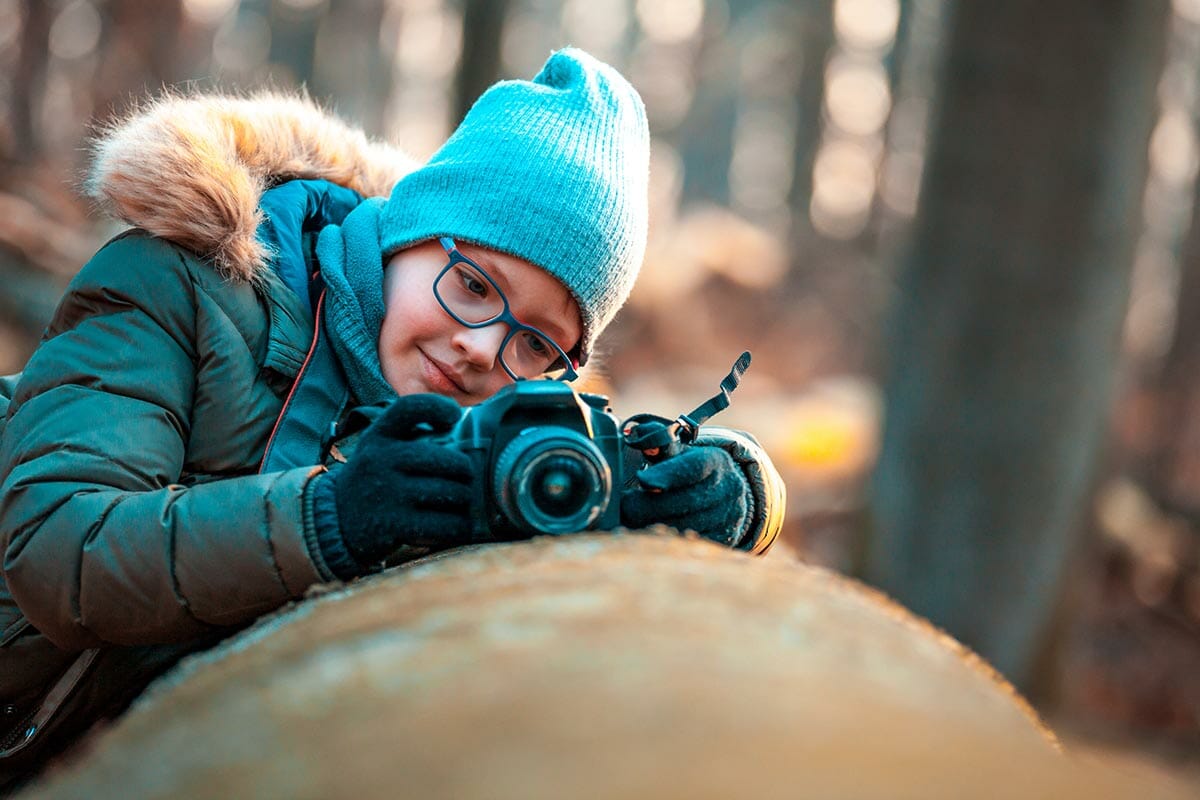 Boy,Using,Digital,Camera,Taking,Photo,In,The,Nature,,Hobbies