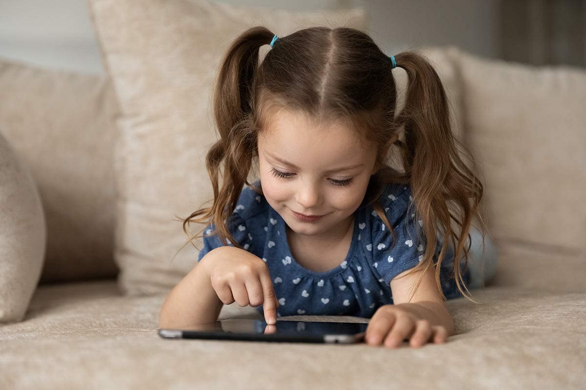 Cute,Little,Caucasian,6s,Girl,Child,Lying,On,Sofa,At