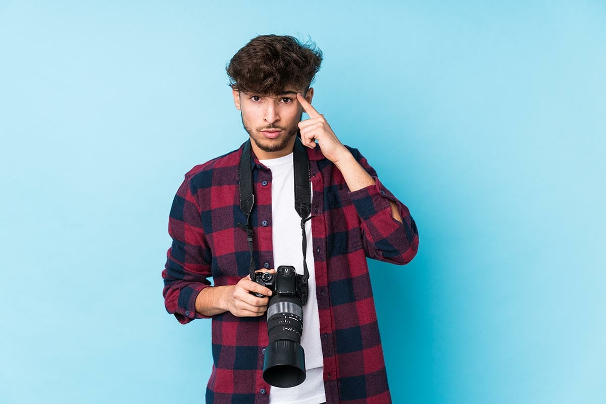 Young,Arab,Photographer,Man,Isolated,Showing,A,Disappointment,Gesture,With