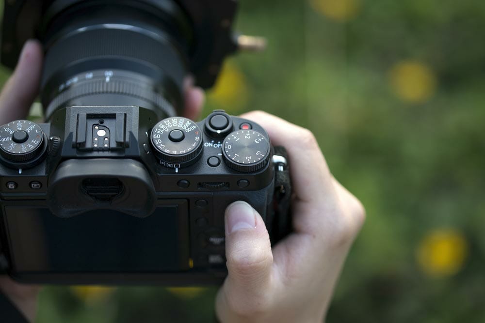 Camera on hand, Landscape photographer, Nature photographer, Professional photographer works