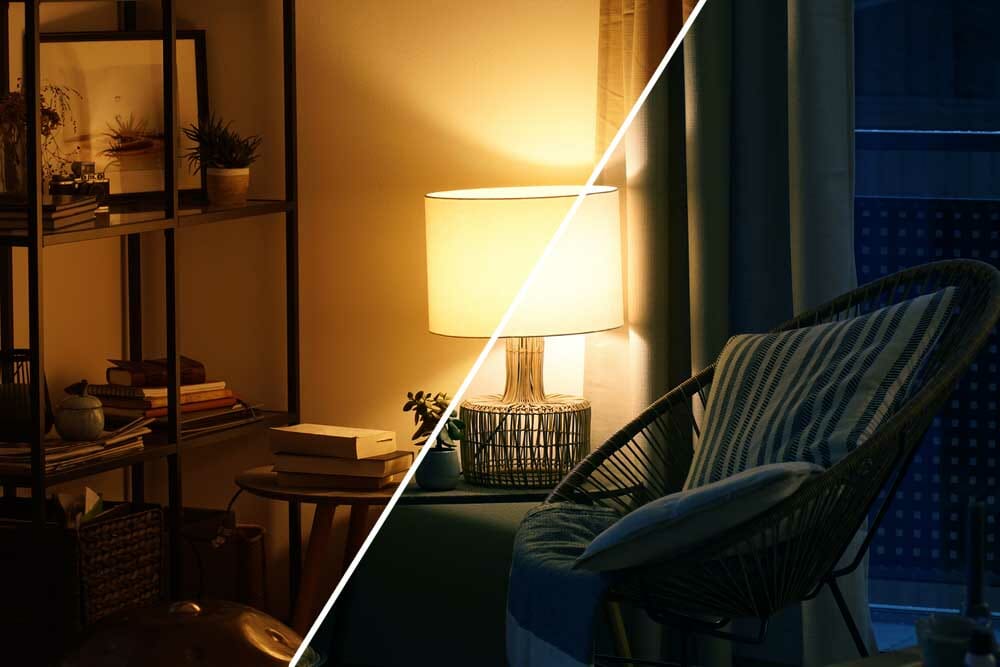 View of a cozy reader's corner with a table lamp spending warm light