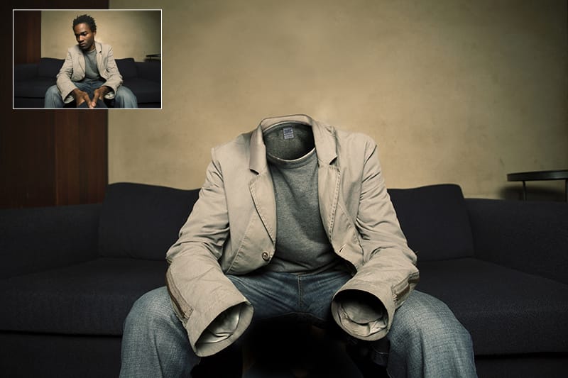 an invisible man sat on a sofa