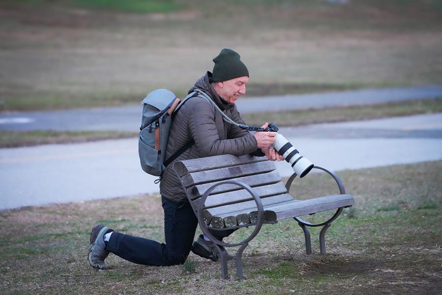 photographer kneeling down