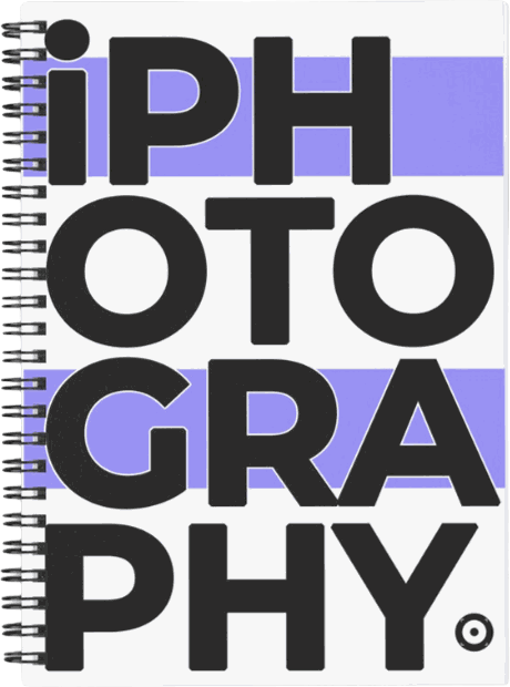 An iPhotography spiral notebook, the wordmark printed in black across lilac bands on a white cover.