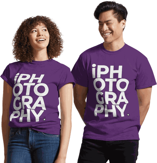 Two people wearing purple iPhotography t-shirts with the wordmark printed large in white across the chest.